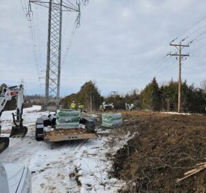 Construction crew working on power lines.